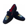 The Albert slipper in black velvet, three gold lions' heads on a blue shield beneath a coronet embroidered on the vamp, red quilted lining.