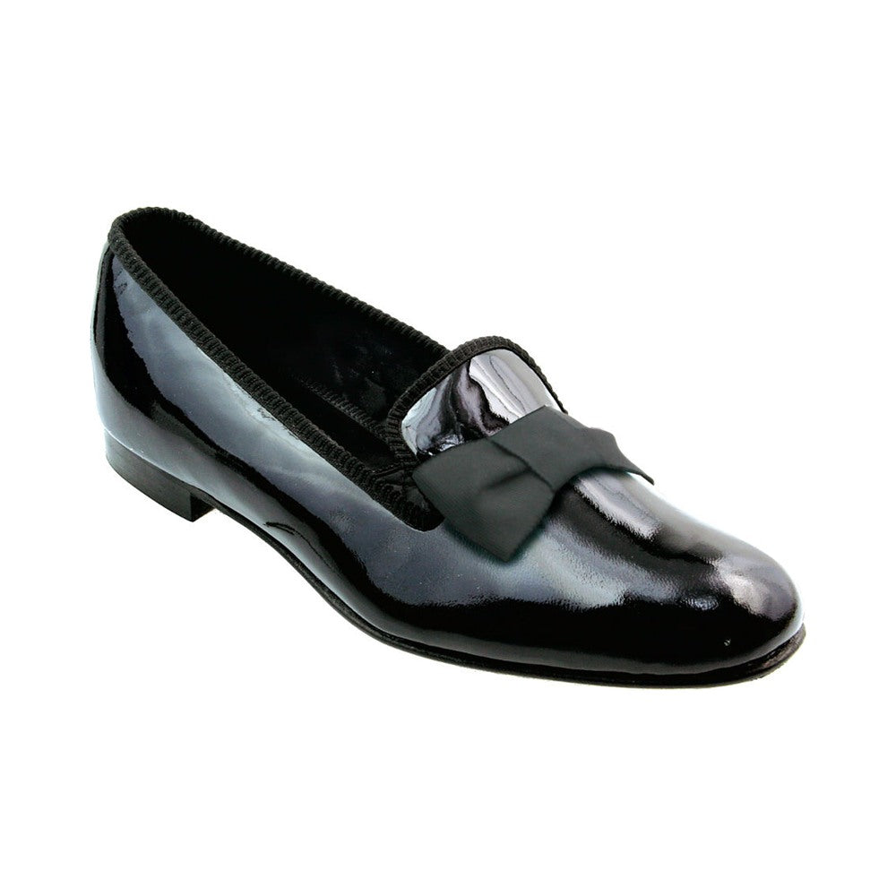 The Albert slipper in black patent calf with a silk bow.