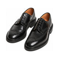 The Pembroke wingtip derby in black, on a Dainite sole.