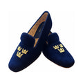 The Albert slipper in blue velvet, three gold crowns embroidered on the vamp, gold quilted lining.